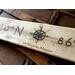 A personalized wedding sign. It shows the location of where you got married with the longitude-latitude coordinates.  